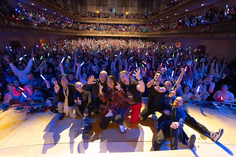 Post-show photo of the performers and the crowd